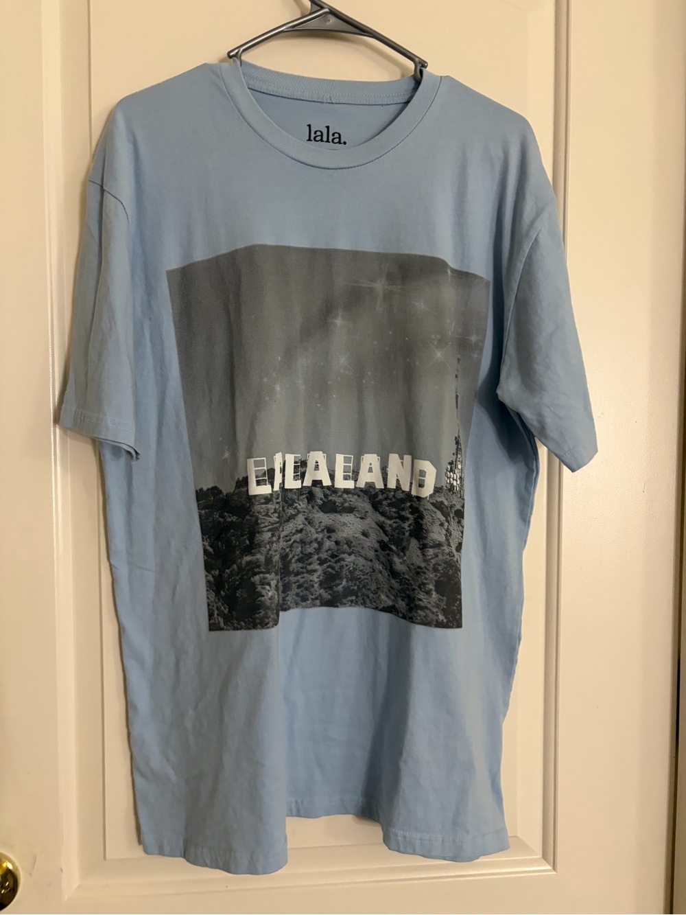 Dressed in lala “lalaland” tee size S/M